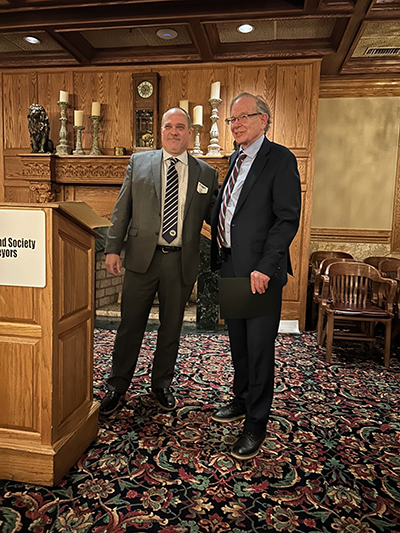 Jim Demma, Esq, PLS receiving award from Thomas Frazier